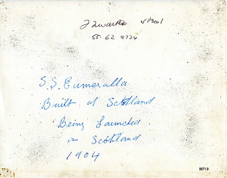 Handwritten labels in blue and black ink in cursive script
