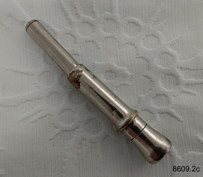 Cigar piercer used to pierce the mouth end of a cigar so it can be smoked.