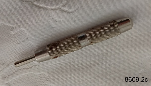 Cigar piercer used to pierce the mouth end of a cigar so it can be smoked.