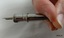 Cigar piercer used to pierce the mouth end of a cigar so it can be smoked.