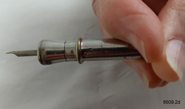Cigar piercer used to pierce the mouth end of a cigar so it can be smoked.