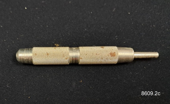 Cigar piercer used to pierce the mouth end of a cigar so it can be smoked.