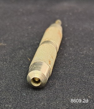 Cigar piercer used to pierce the mouth end of a cigar so it can be smoked.