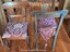 Squab 1 top side up on left chair, Squab 2 top side up on right chair