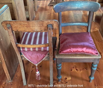 Squab 1 reverse side up on left chair, Squab 2 reverse side up on right chair