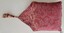 Crimson and cream floral top of cover with triangular flap and tassel