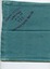 Folded view, right side up, of a green surgical cloth with hospital identification, showing the stamp of the hospital linen service in red. 