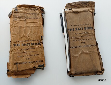 Two brown wax paper covered packages titled "The Raft Book"