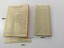 Paper booklet titled "The Raft Book" by Harold Gatty and a folded paper chart and calender strip 