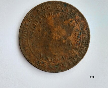 Round metal coin in a weathered condition with two lines of writing around the edge