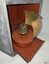 Oil burner and reflector on tray, which is half removed from lamp