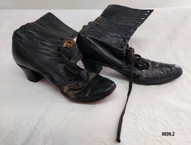 Pair of lady's black leather lace up boots