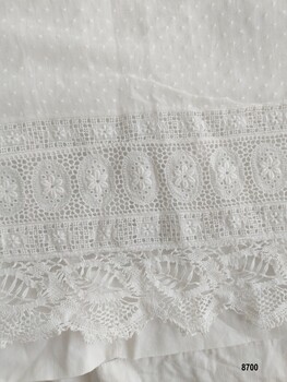 Lace edging on petticoat showing pinspot fabric and eyelet lace