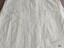 Two pockets set into front panel of overskirt.