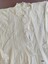 Bodice featuring front opening placket and decorative pintucking and lace