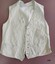 Cream waistcoat with five button holes, five stud holes, a buttonhole for a fob chain and three pockets.