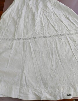Lady's skirt with eyelet lace insert and V shaped insert