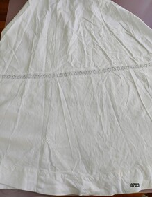 Lady's skirt with eyelet lace insert and V shaped insert