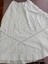 Front of lady's skirt showing eyelet lace insert