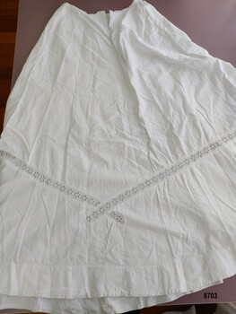 Front of lady's skirt showing eyelet lace insert
