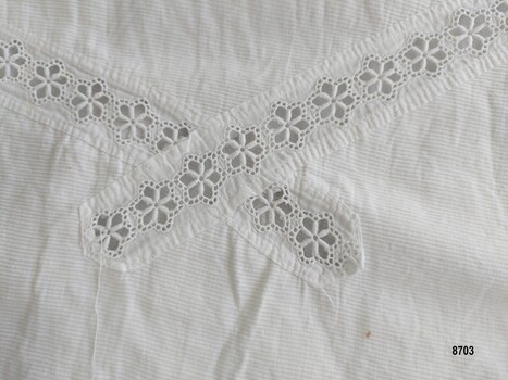 View of lace insert showing the diagonal crossed design