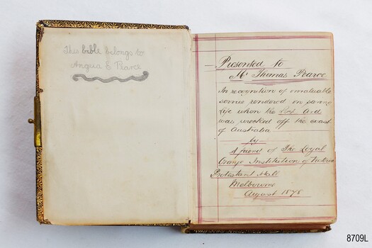 Cream two-page opening with pencil and pen inscriptions