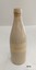 A beige stoneware bottle with two pieces of tape on one side