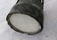 Round metal cylinder with opaque glass in end