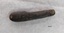 Brown wooden handle of pocket knife with small chip missing at base and metal cap in good condition.