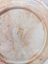Underside of plate showing maker's mark and detail of rim.