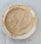 Top of plate 8727.2 showing initial glaze with brown staining and crazing - no chips.