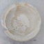 View of plate 8727.3 showing the rim with the missing chip, plus the areas with and without the initial glaze.