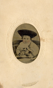 Portrait of a child in a photograph card