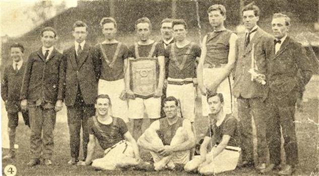 An Athletics team with trophy