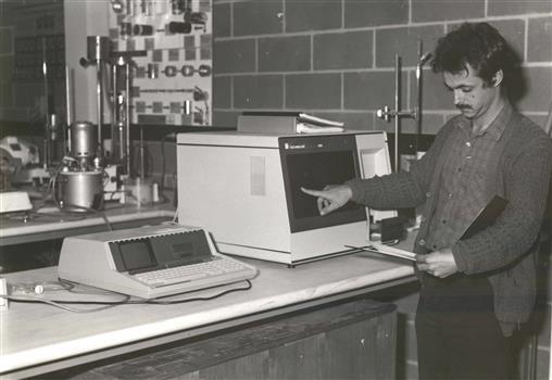 A man uses equipment in a laboratory