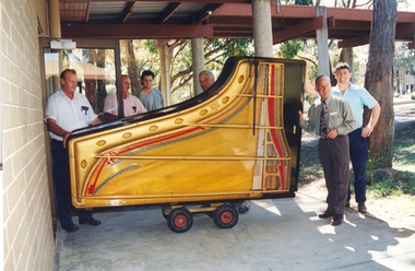 Photograph (colour), University of Ballarat Maintenance staff move the Errard Concert Grand Piano into Founders' Hall, 03/1996