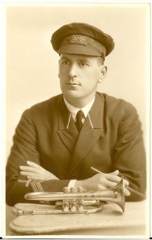 A uniformed man with cornet