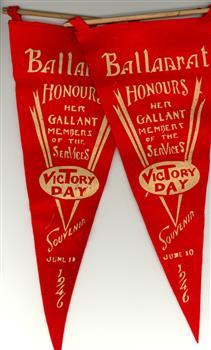 Two triangular felt penants
