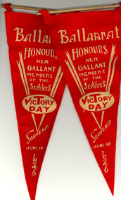 Two triangular felt penants