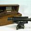 Surveying level and a hinged timber box