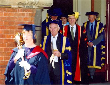 A procession of people in academic regalia