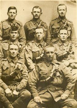 Eight men in Australian Army uniform