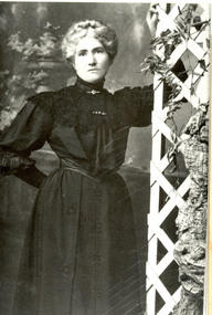 Woman wearing a long black dress
