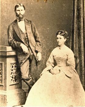 A seated woman and and standing man