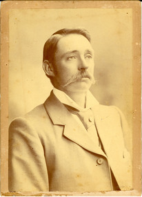 a man with moustache