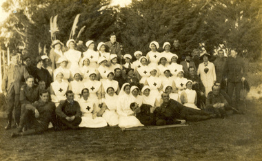 A group of nurses and soldiers