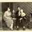 Two women, a man and a todler