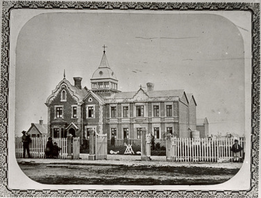 Double storey building with tower