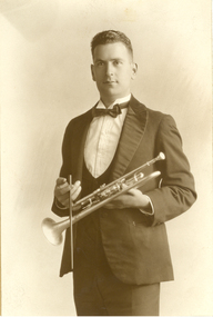 Photograph - Black and White, Frank Wright with trumpet and conductor's baton