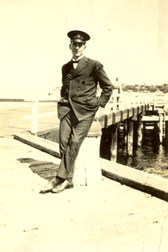 Photograph - Black and White, Frank Wright at a pier, 1920s